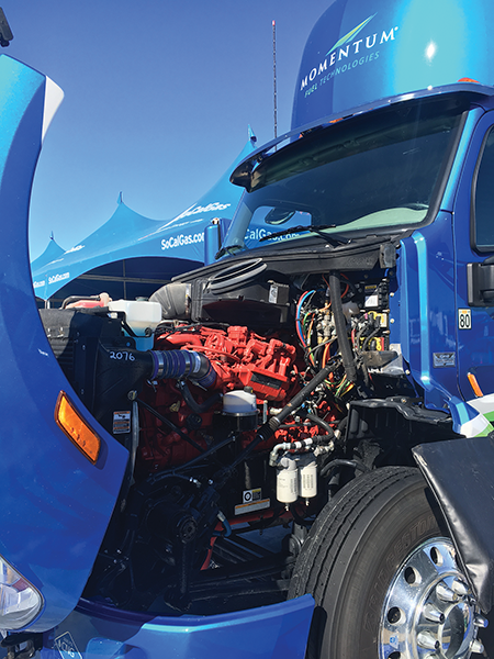 SoCalGas shows one engine that his helping drive down greenhouse gas emissions on dairies at this week's World Ag Expo. submitted photo